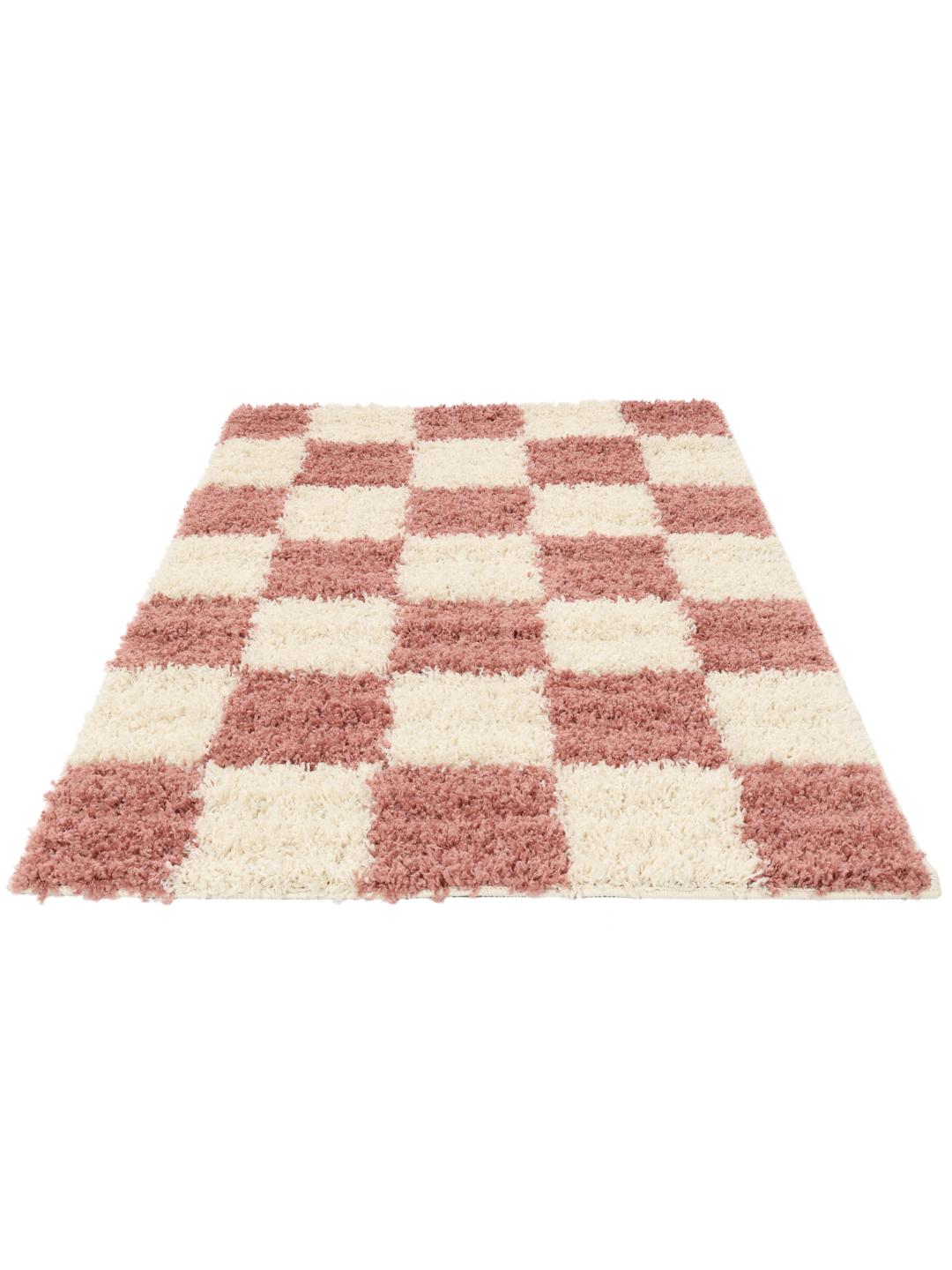 roze en wit tapijt met dikke textuur