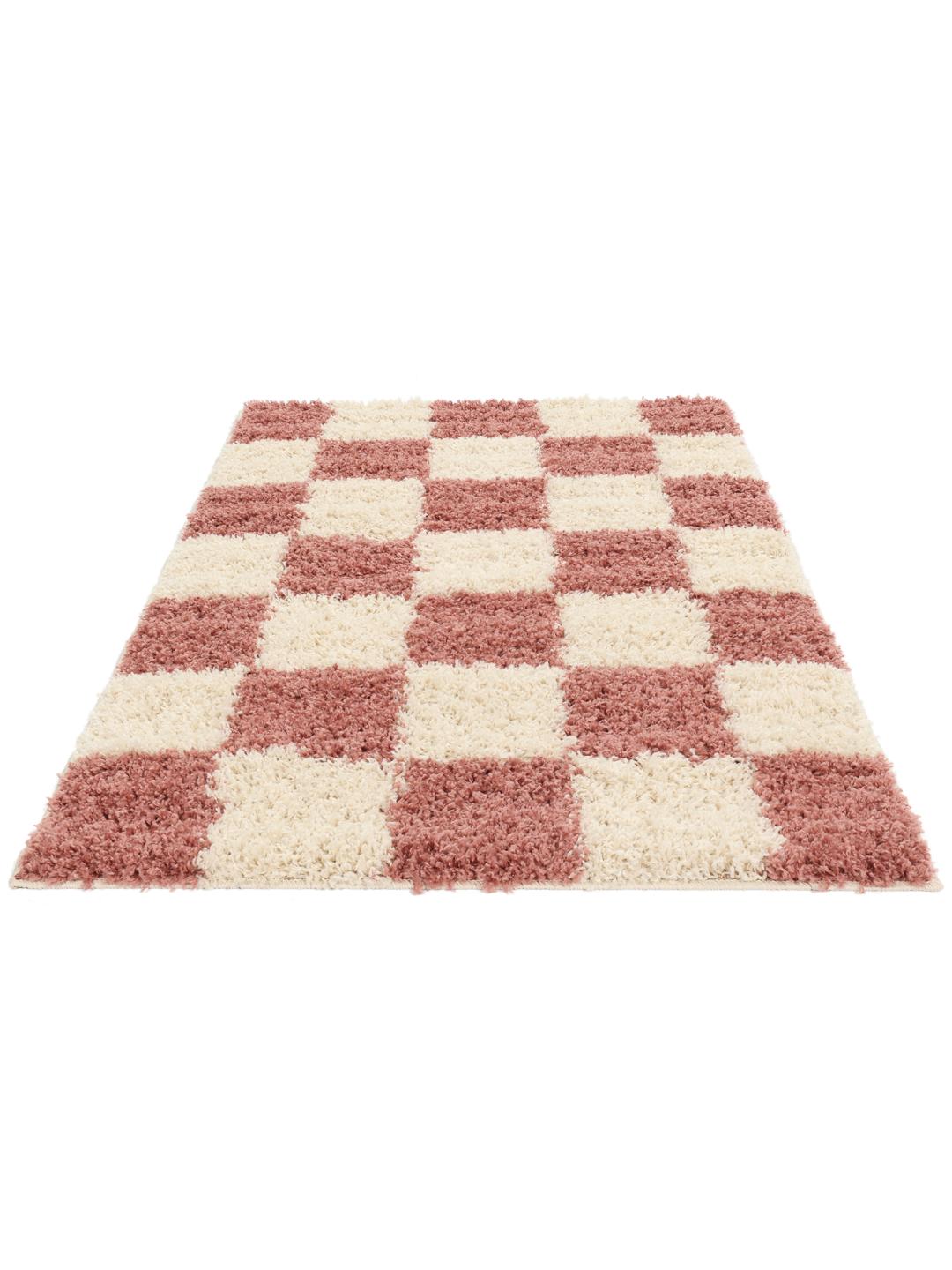 roze en wit tapijt met dikke textuur