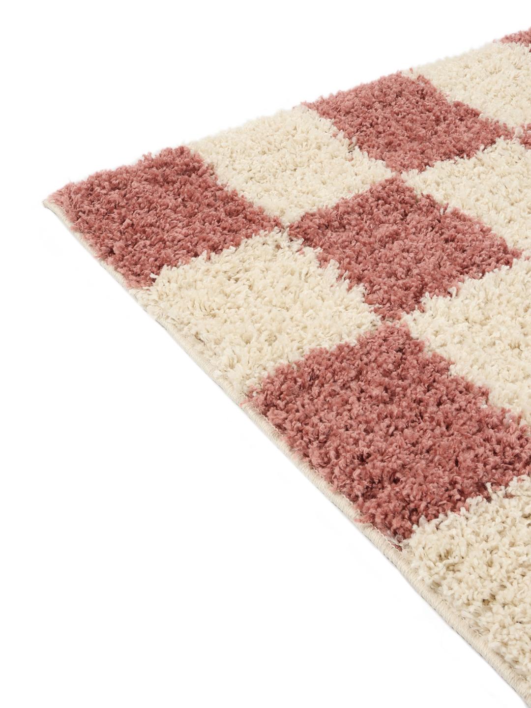 roze en wit tapijt met dikke textuur