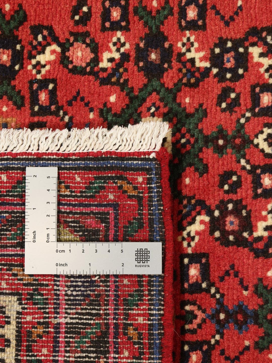 Met de hand geknoopte Hosseinabad loper uit het Midden-Oosten in dieprood