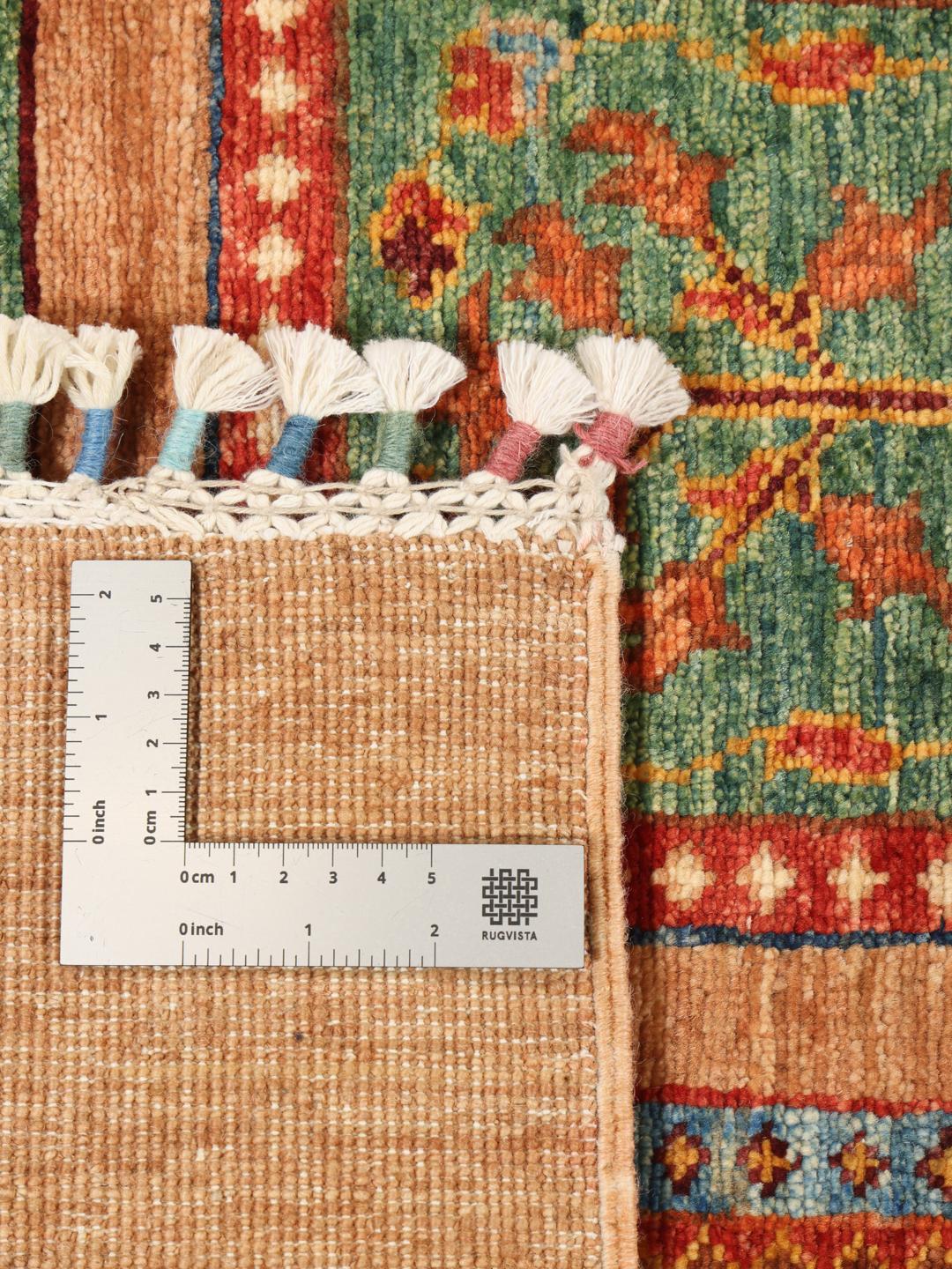 Handgeknoopt tapijt uit Afghanistan in bruin met levendige geometrische motieven