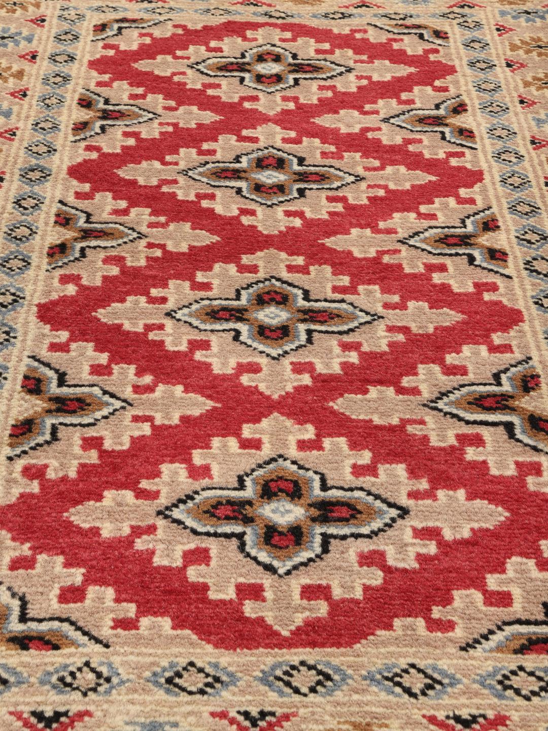 Hand-knotted Pakistan Bokhara 2ply rug in red and beige wool