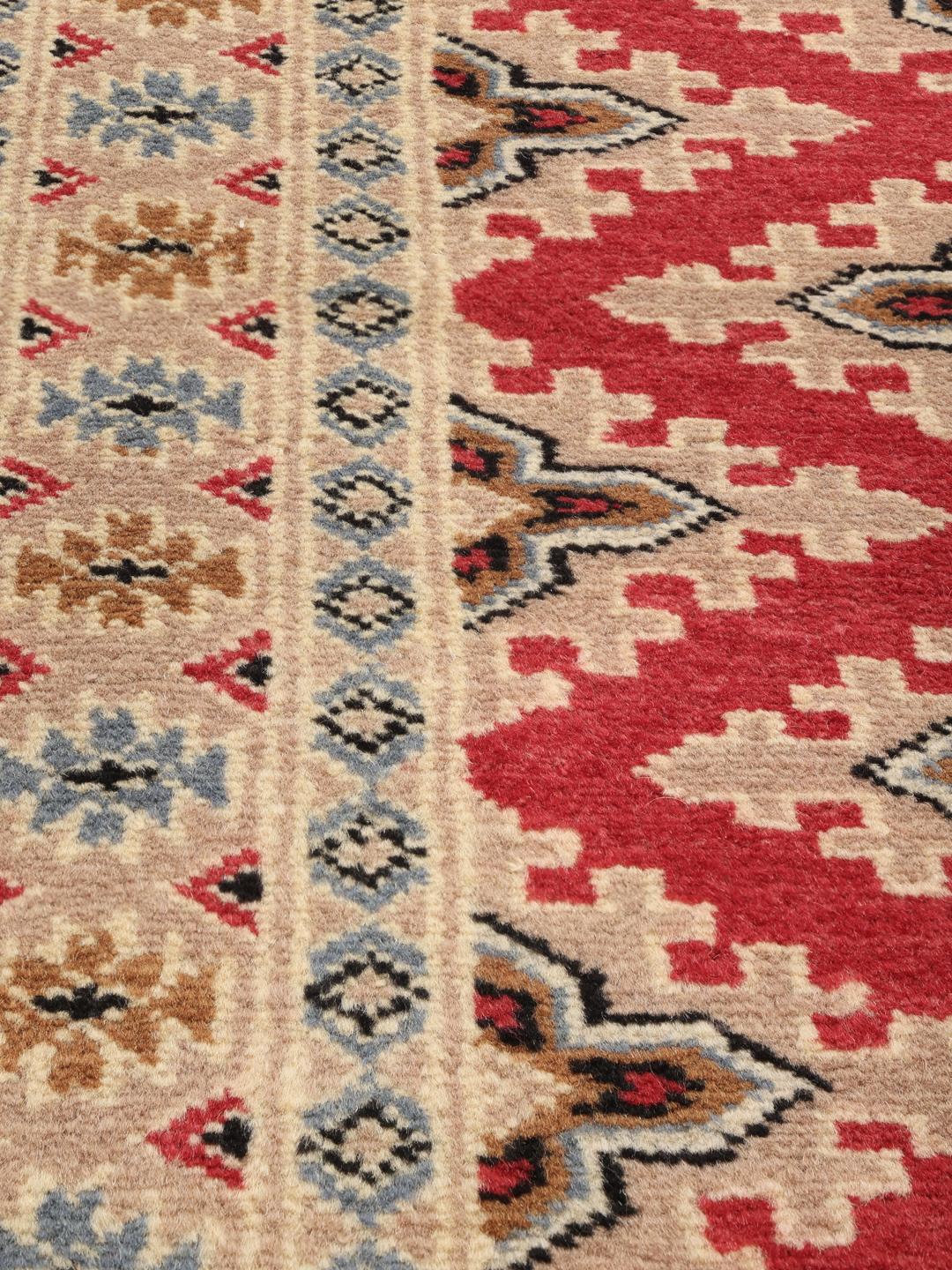 Hand-knotted Pakistan Bokhara 2ply rug in red and beige wool