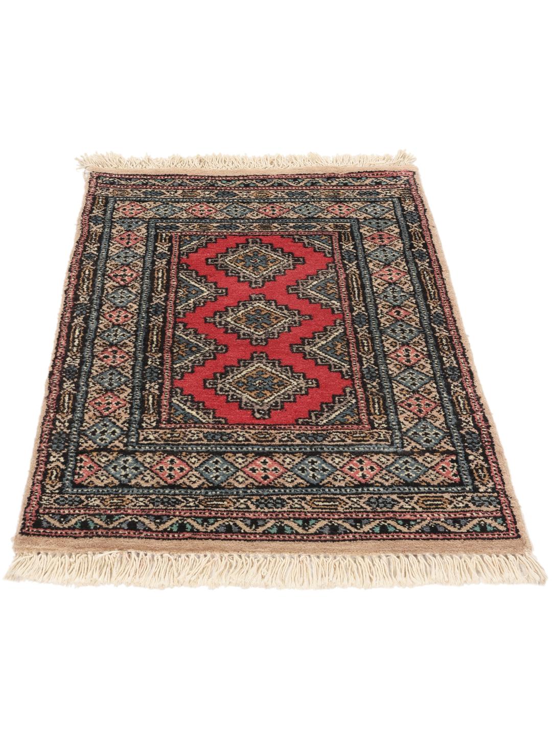 Hand-knotted Pakistan Bokhara rug in red with traditional geometric patterns