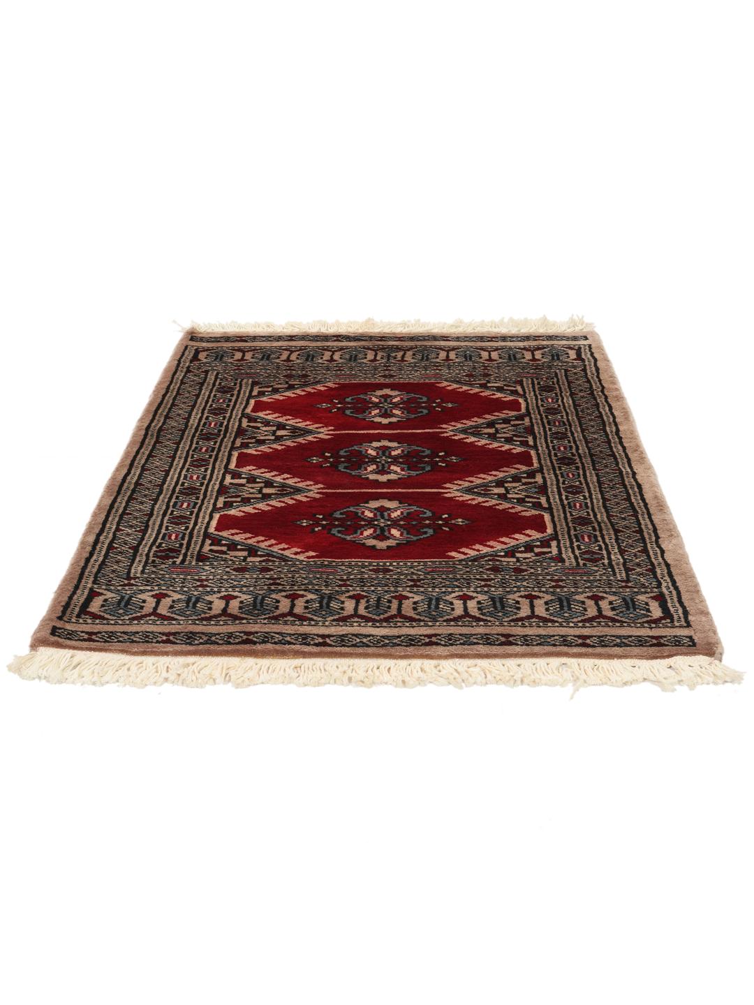 A hand-knotted Pakistan Bokhara rug with a deep red field and intricate geometric medallions.