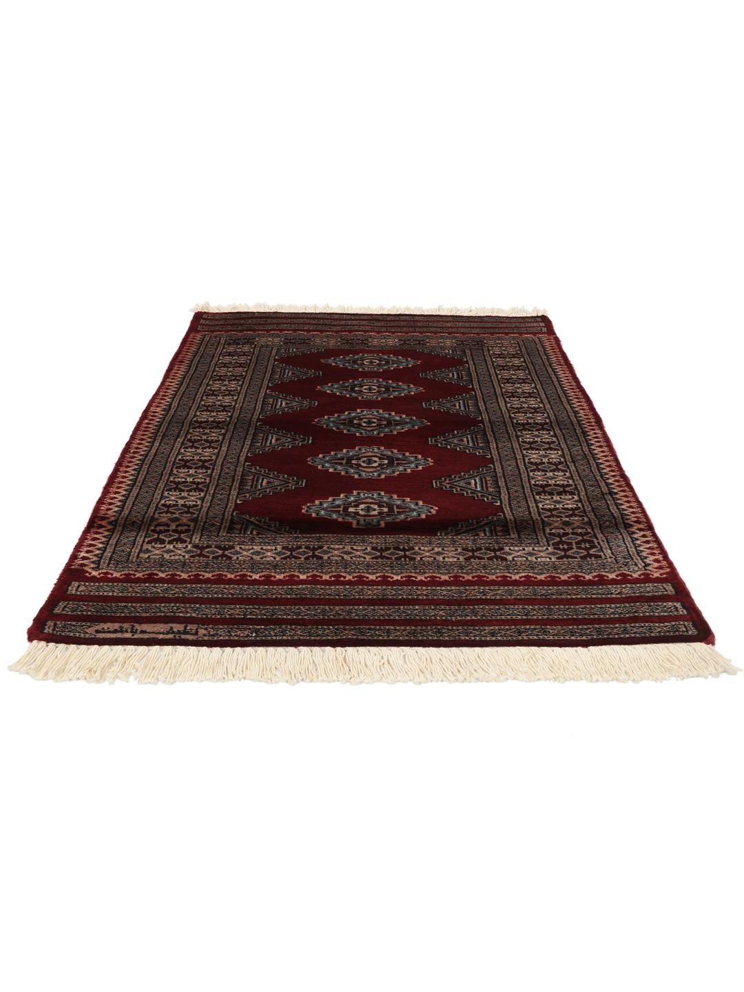 A hand-knotted red Pakistan Bokhara 3ply rug with geometric motifs.