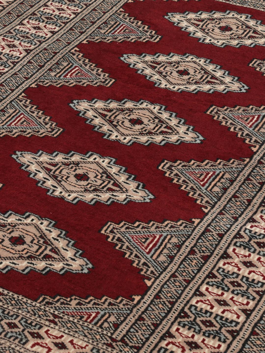 Hand-knotted Pakistan Bokhara 3ply rug in dark-red with classic motifs