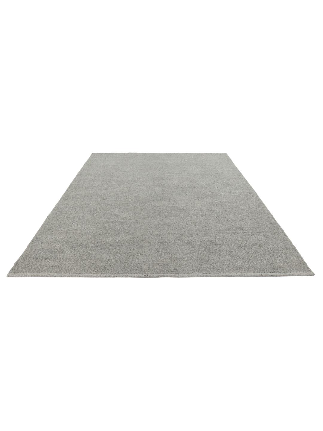 Light grey rug with a structured weave