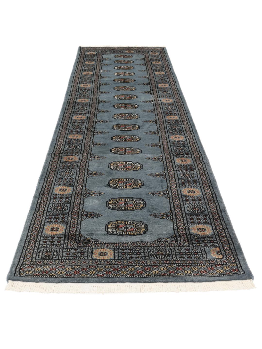 Hand-knotted Pakistan Bokhara runner rug in blue with traditional motifs