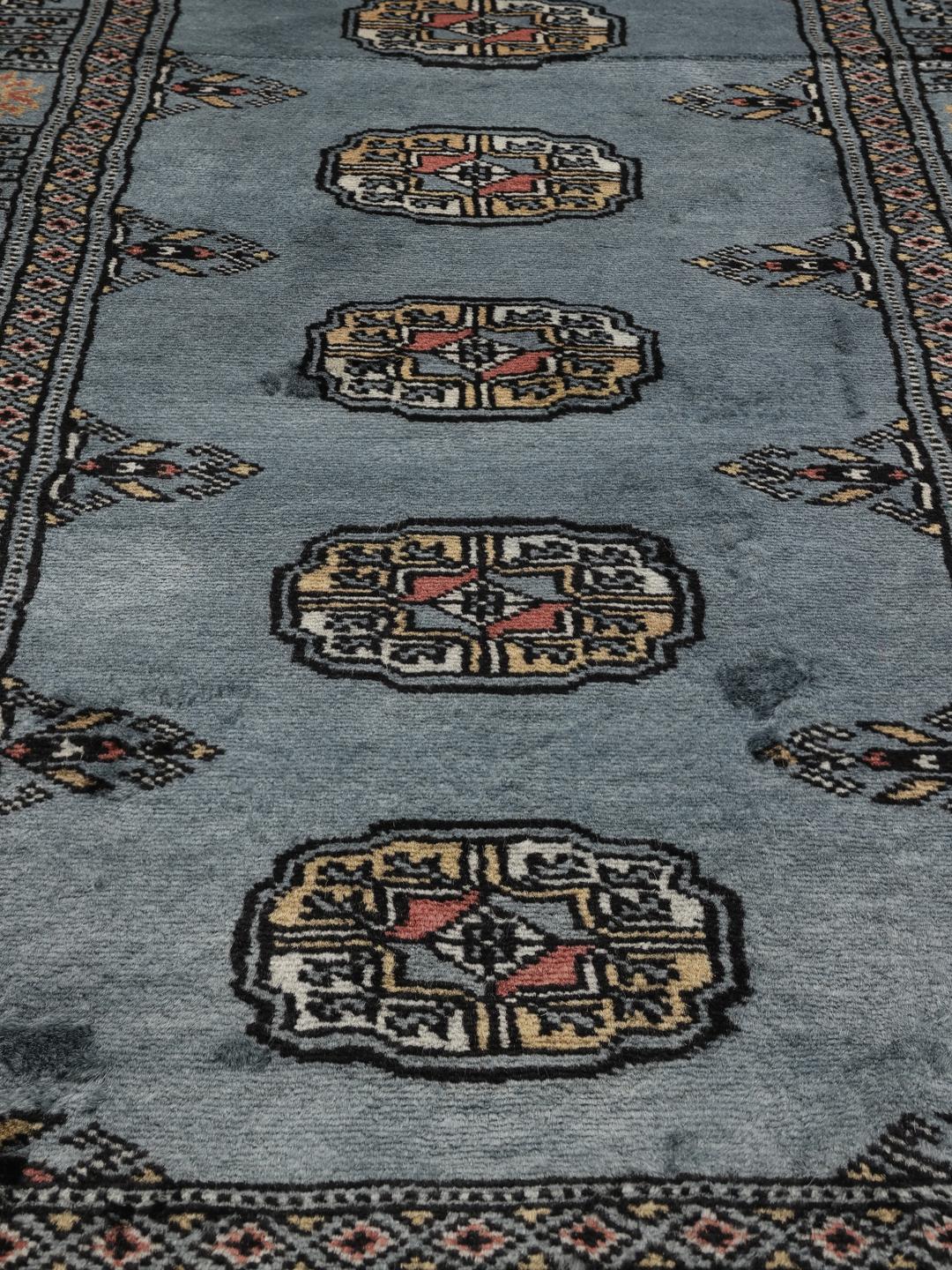 Hand-knotted Pakistan Bokhara runner rug in blue with traditional motifs