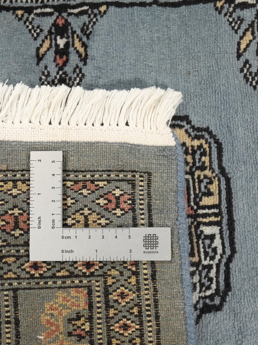 Hand-knotted Pakistan Bokhara runner rug in blue with traditional motifs