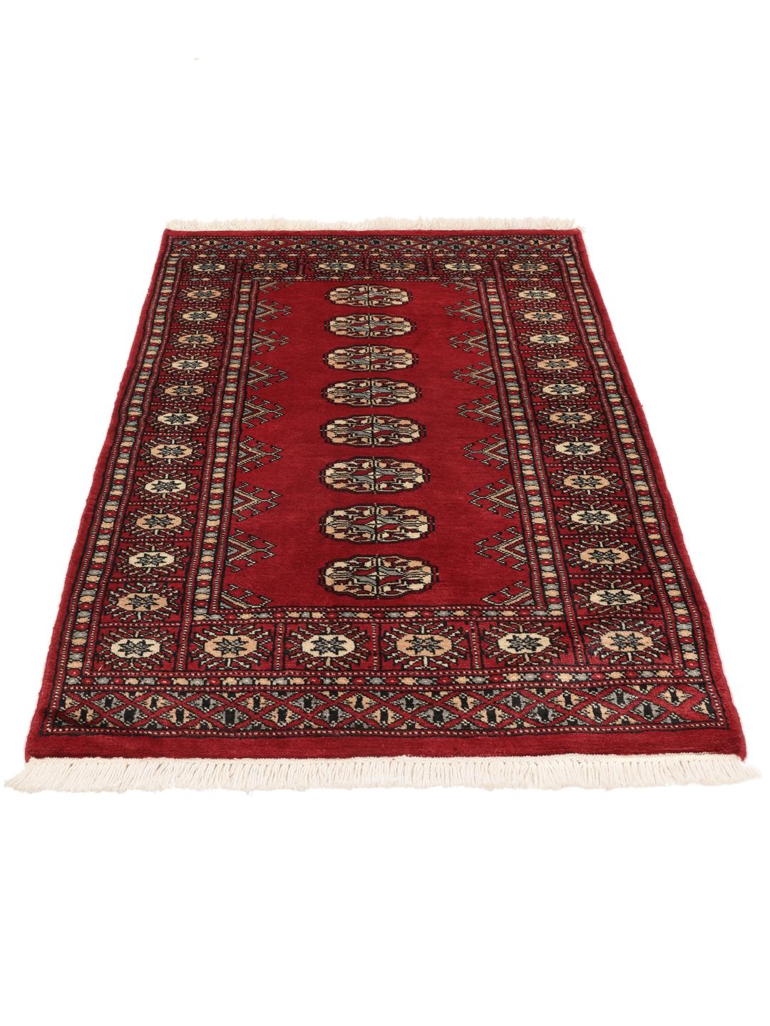 A hand-knotted Pakistan Bokhara rug with a dark-red field and classic repeating motifs.