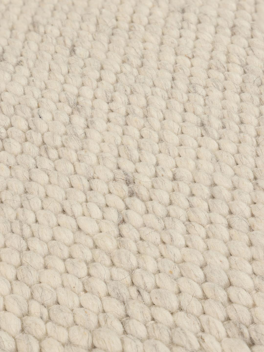 Håndvævet beige uldtæppe