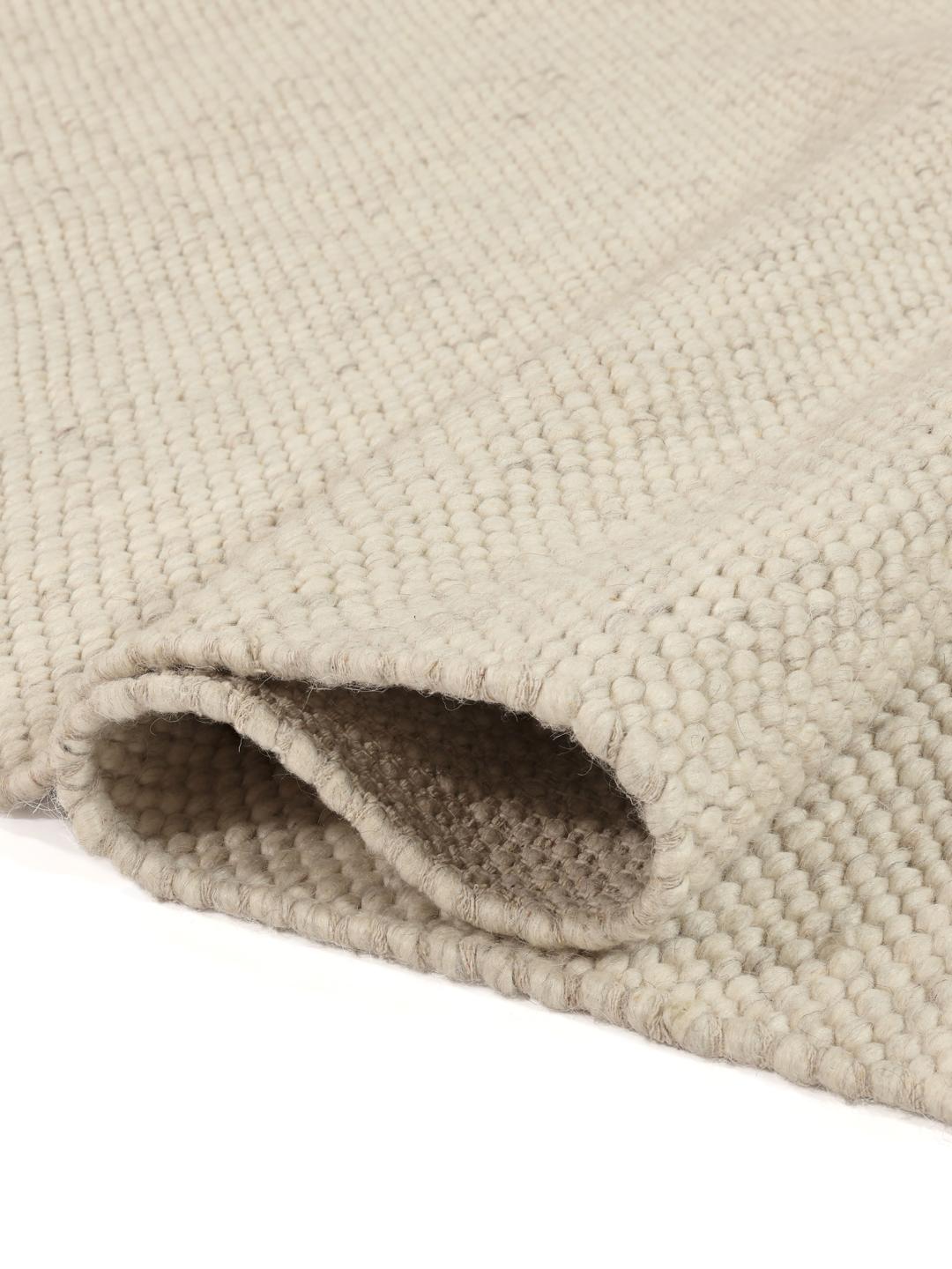 Handvävd beige ullmatta
