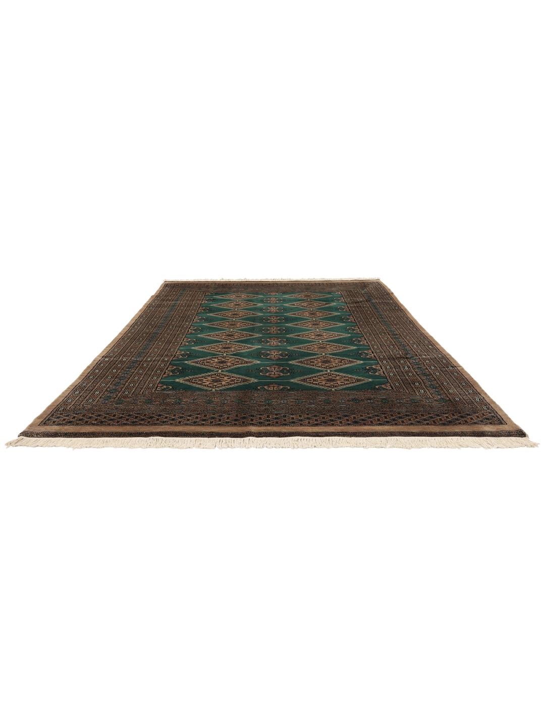 A hand-knotted Pakistan Bokhara rug with a vibrant green field and intricate diamond motifs.