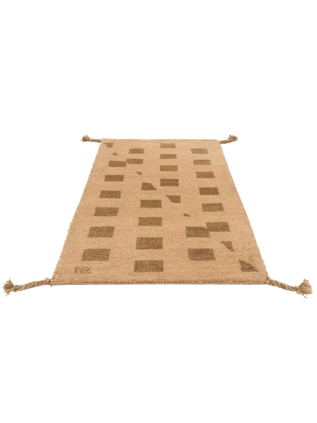 Hand-knotted Gabbeh wool rug from the Middle East in beige