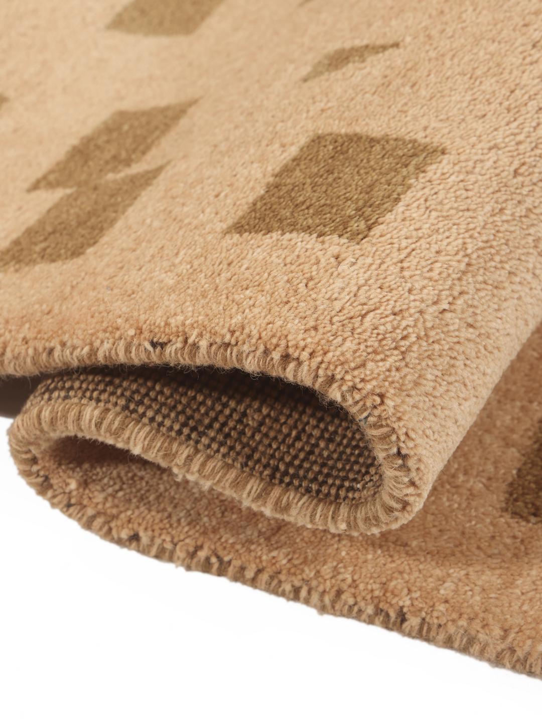 Hand-knotted Gabbeh wool rug from the Middle East in beige
