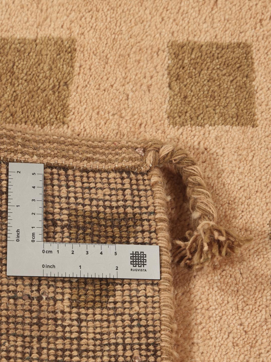 Hand-knotted Gabbeh wool rug from the Middle East in beige