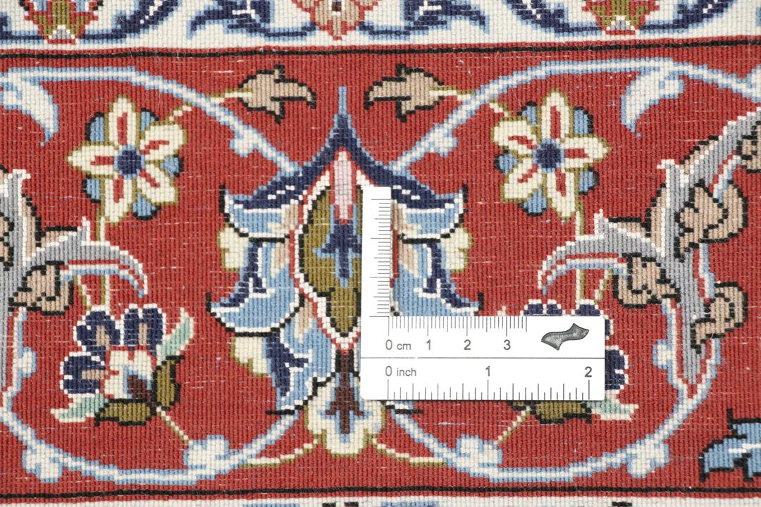 Handgeknoopt Isfahan-tapijt uit het Midden-Oosten in rood en crème