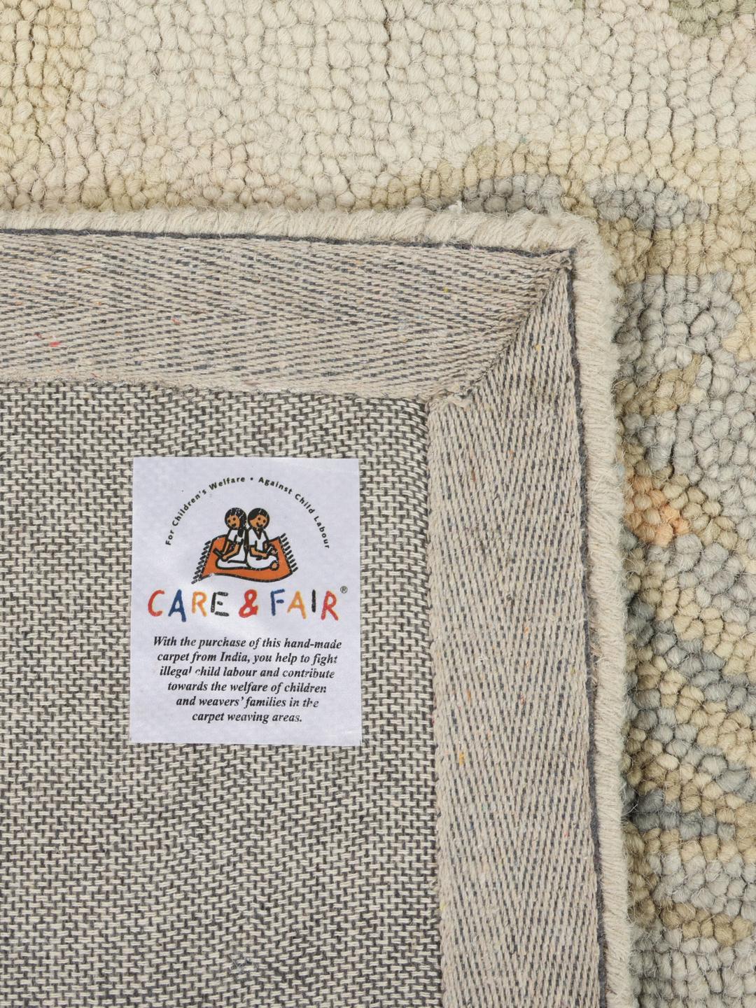 beige en meerkleurig vloerkleed