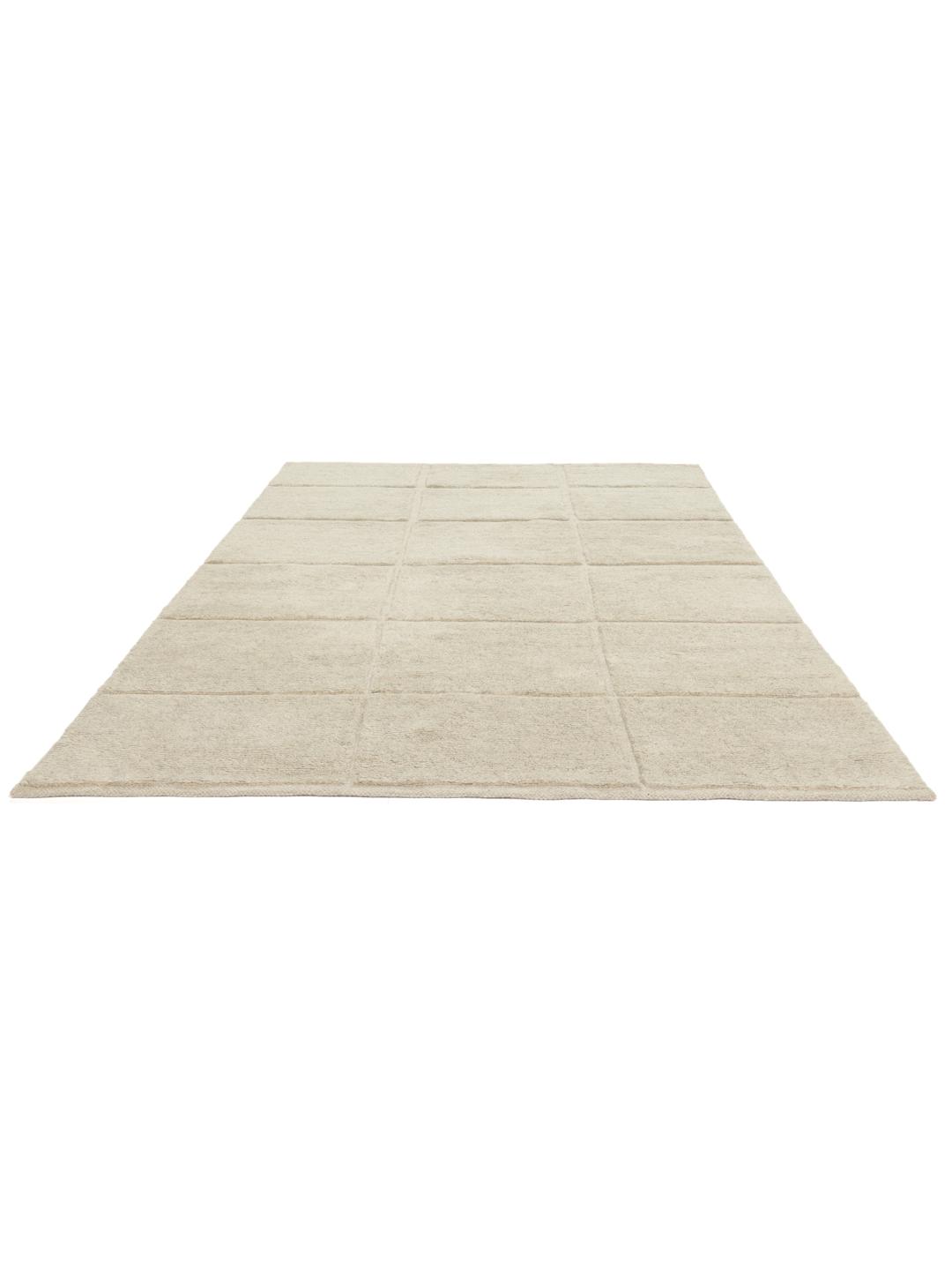 Beige tapijt met details in hoge en lage pool