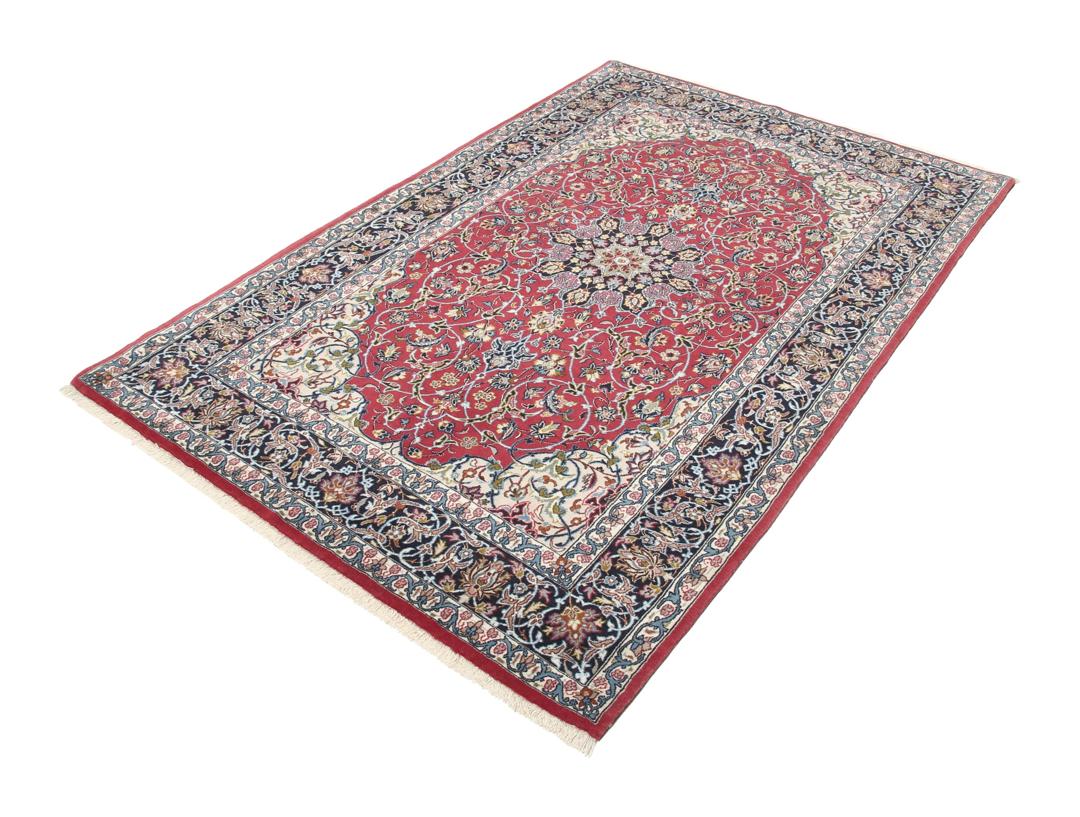 Hand-knotted Isfahan rug with dark-red and black floral patterns