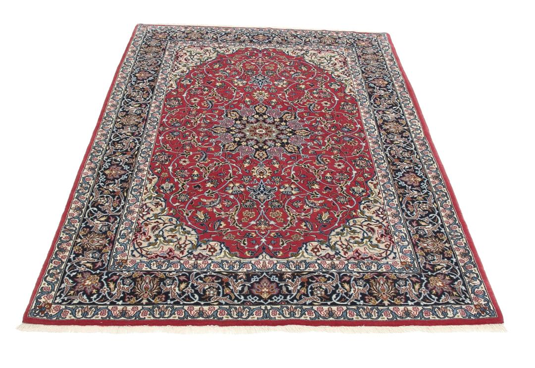 Hand-knotted Isfahan rug with dark-red and black floral patterns