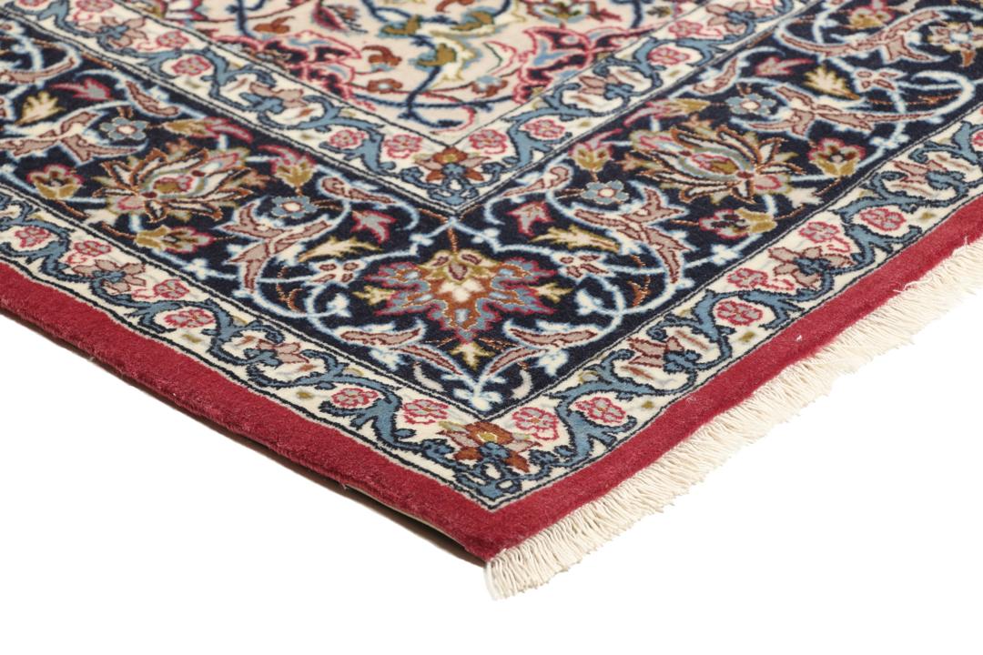 Hand-knotted Isfahan rug with dark-red and black floral patterns