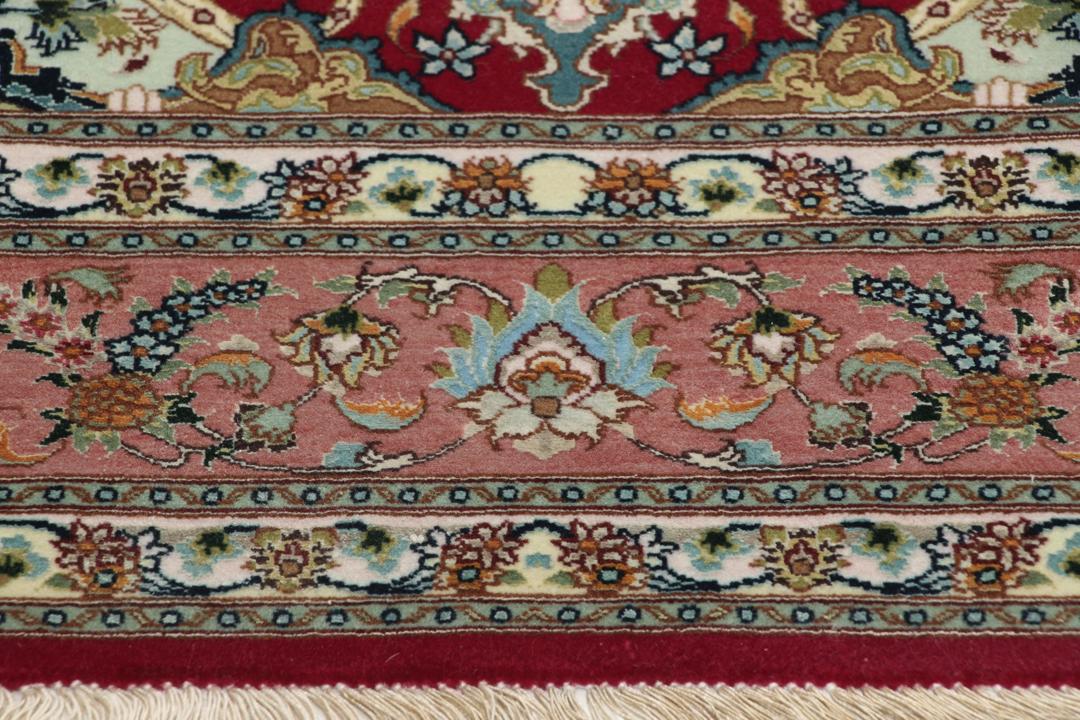 Met de hand geknoopt Tabriz-tapijt uit het Midden-Oosten in rood met bloemmotieven