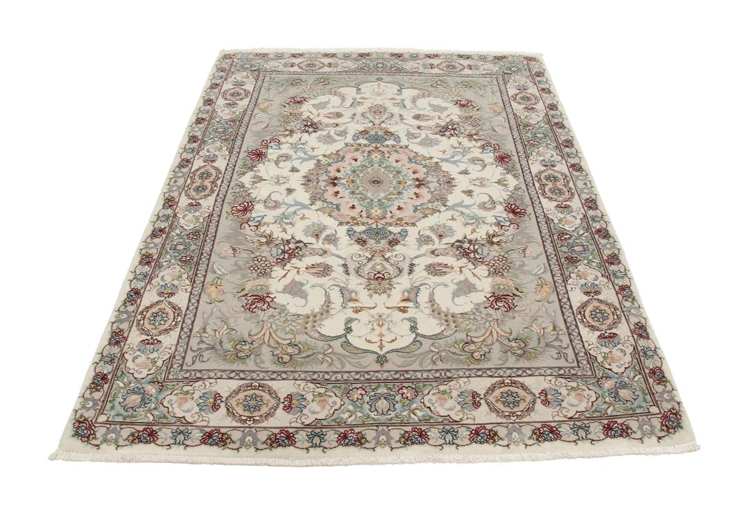 Håndknyttet Tabriz-tæppe med blomstermotiver i beige og bløde toner