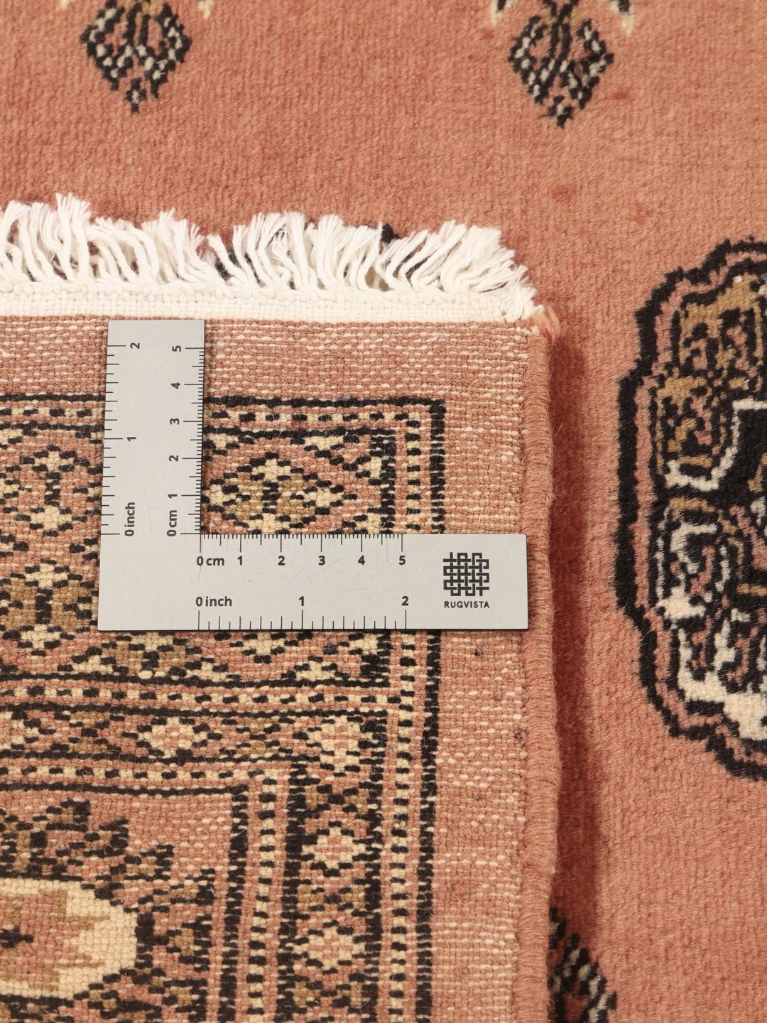 Hand-knotted Pakistan Bokhara 2ply rug in red with traditional motifs