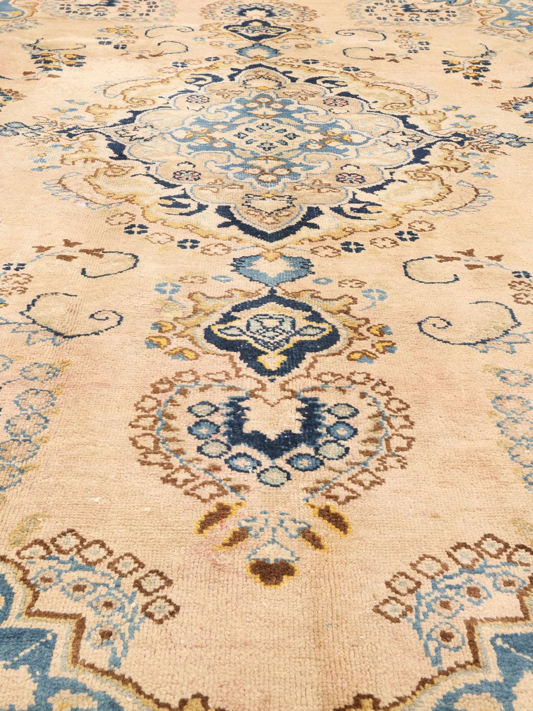 Vintage hand-knotted rug from the Middle East in beige and blue