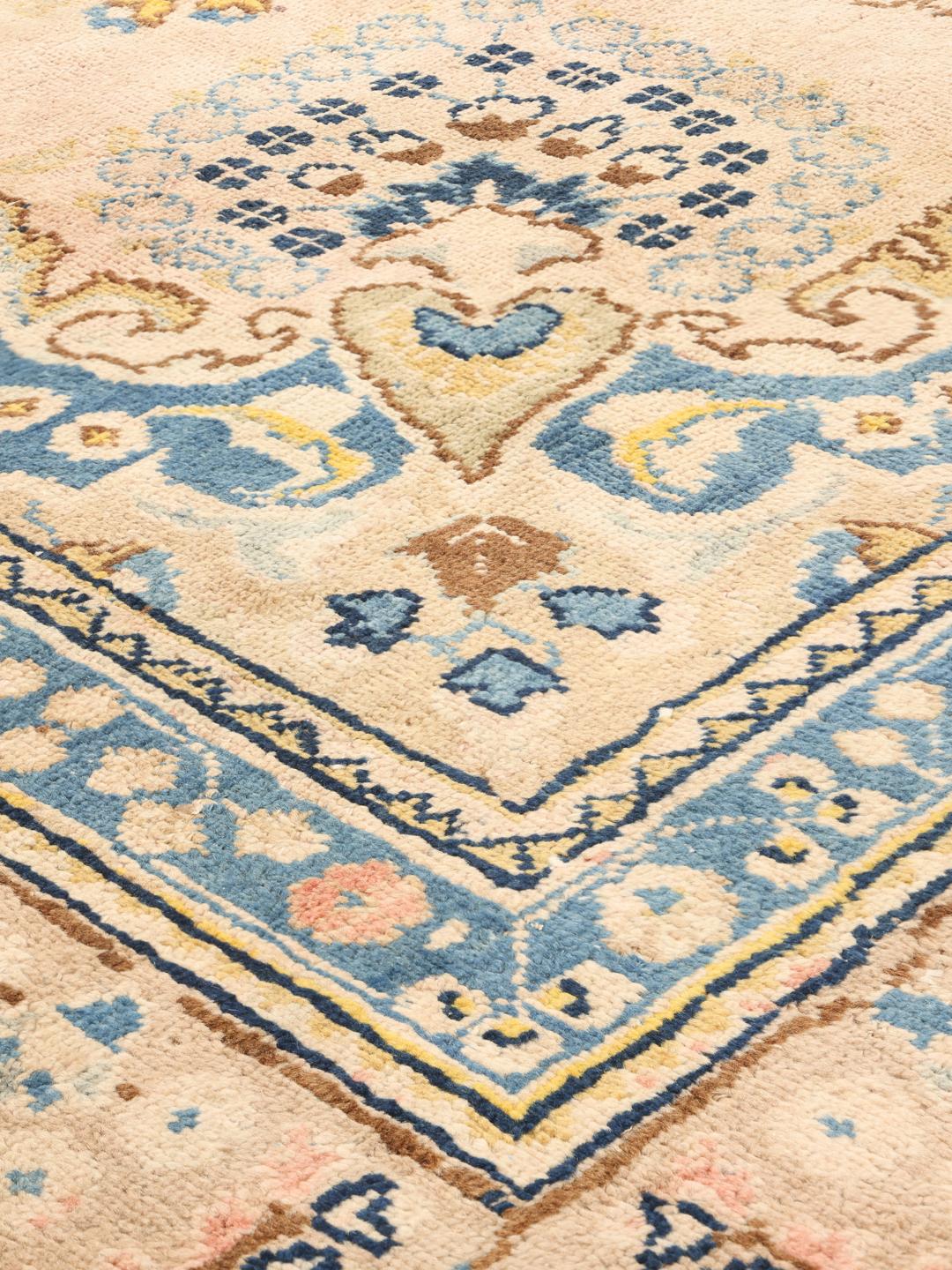 Vintage hand-knotted rug from the Middle East in beige and blue