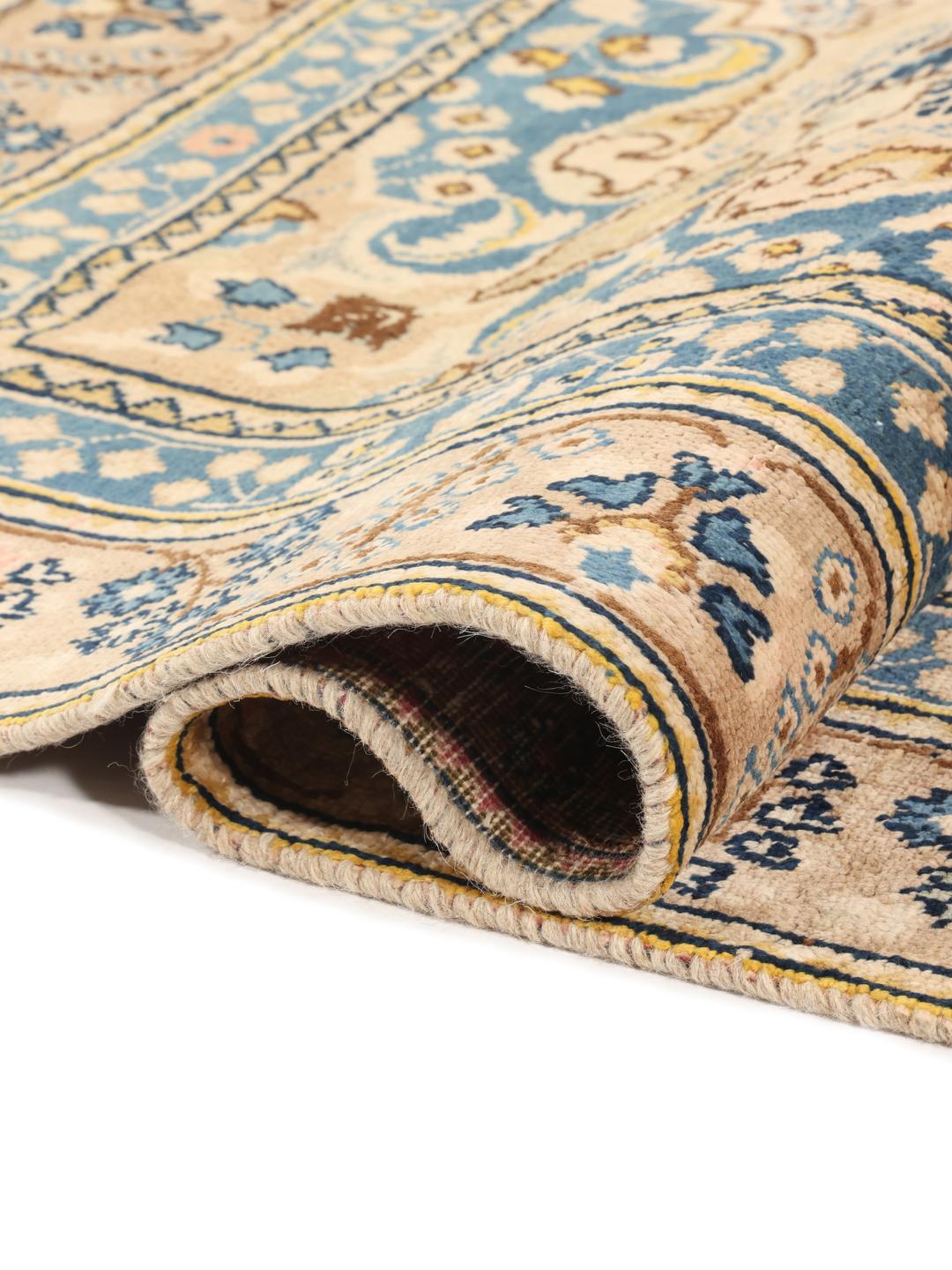 Vintage hand-knotted rug from the Middle East in beige and blue