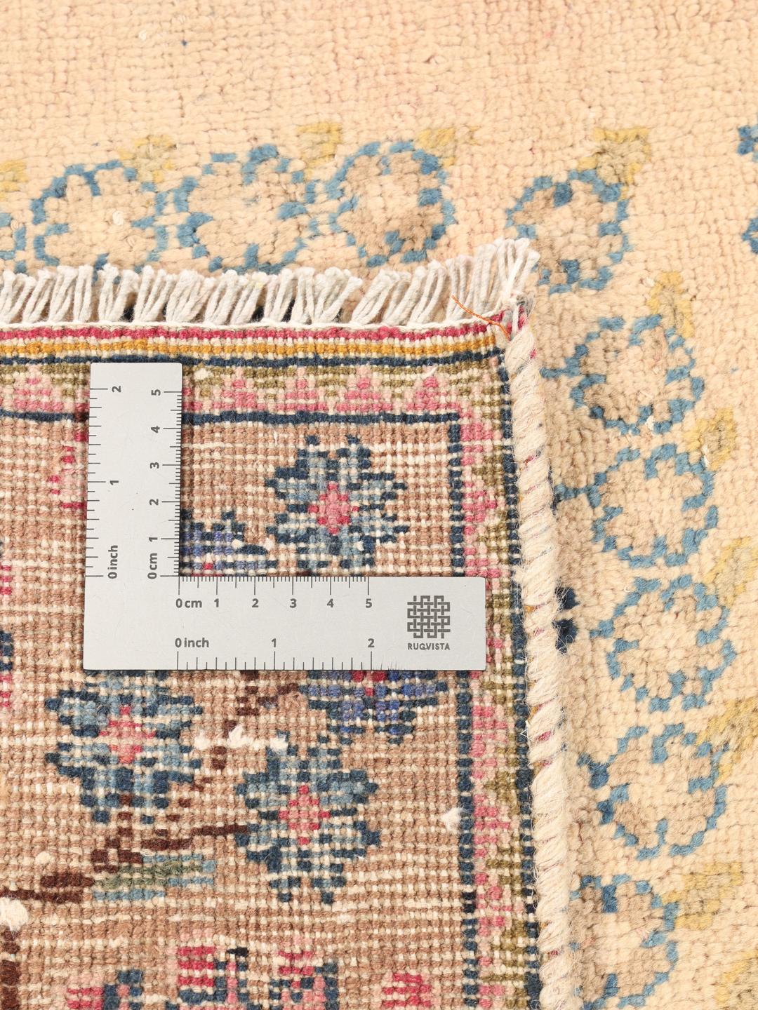 Vintage hand-knotted rug from the Middle East in beige and blue
