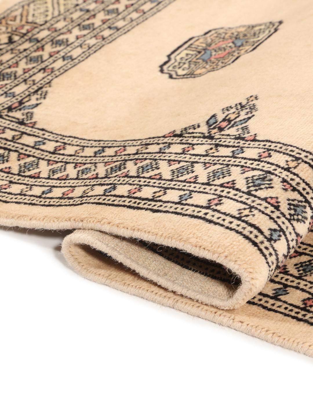Hand-knotted Pakistan Bokhara 2ply rug in beige with traditional patterns