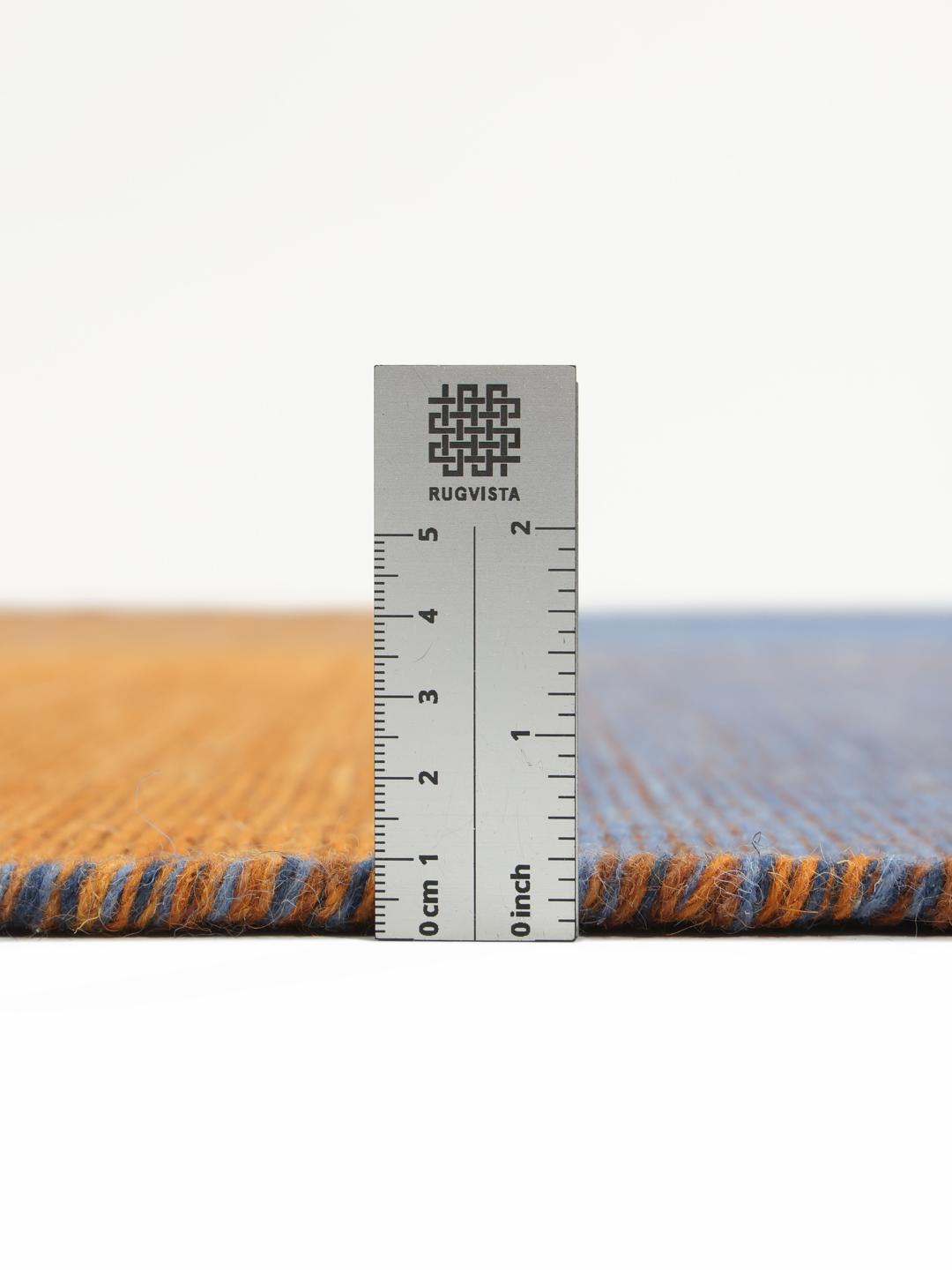 Handgeweven wollen loper in oranje en blauw met franjes