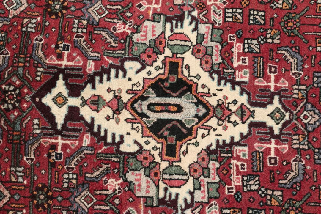 Handgeknoopt Bidjar-tapijt uit het Midden-Oosten in rood met zijden accenten