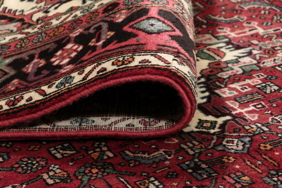 Handgeknoopt Bidjar-tapijt uit het Midden-Oosten in rood met zijden accenten