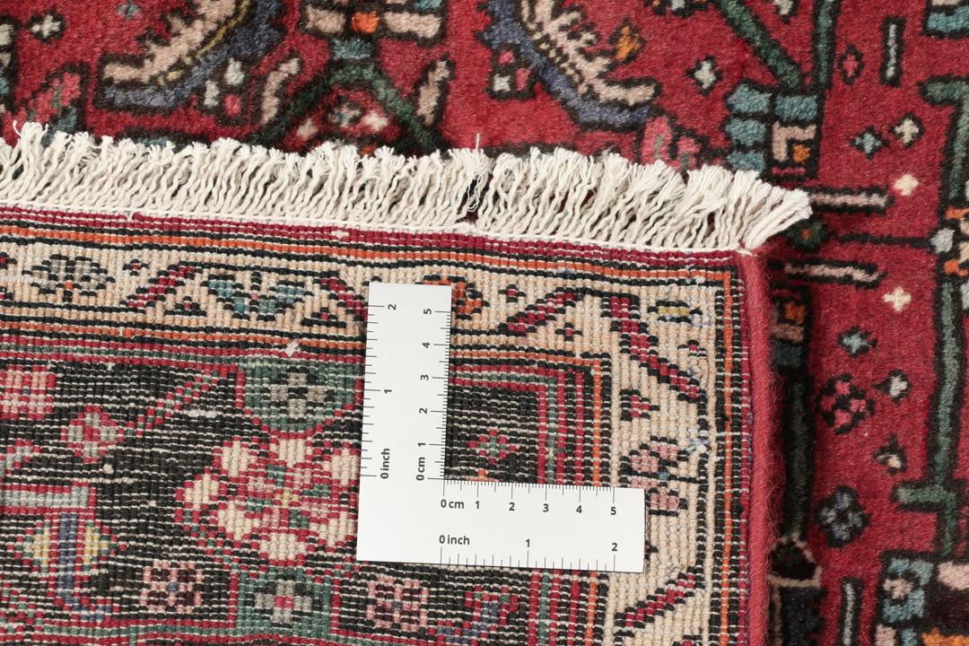Handgeknoopt Bidjar-tapijt uit het Midden-Oosten in rood met zijden accenten
