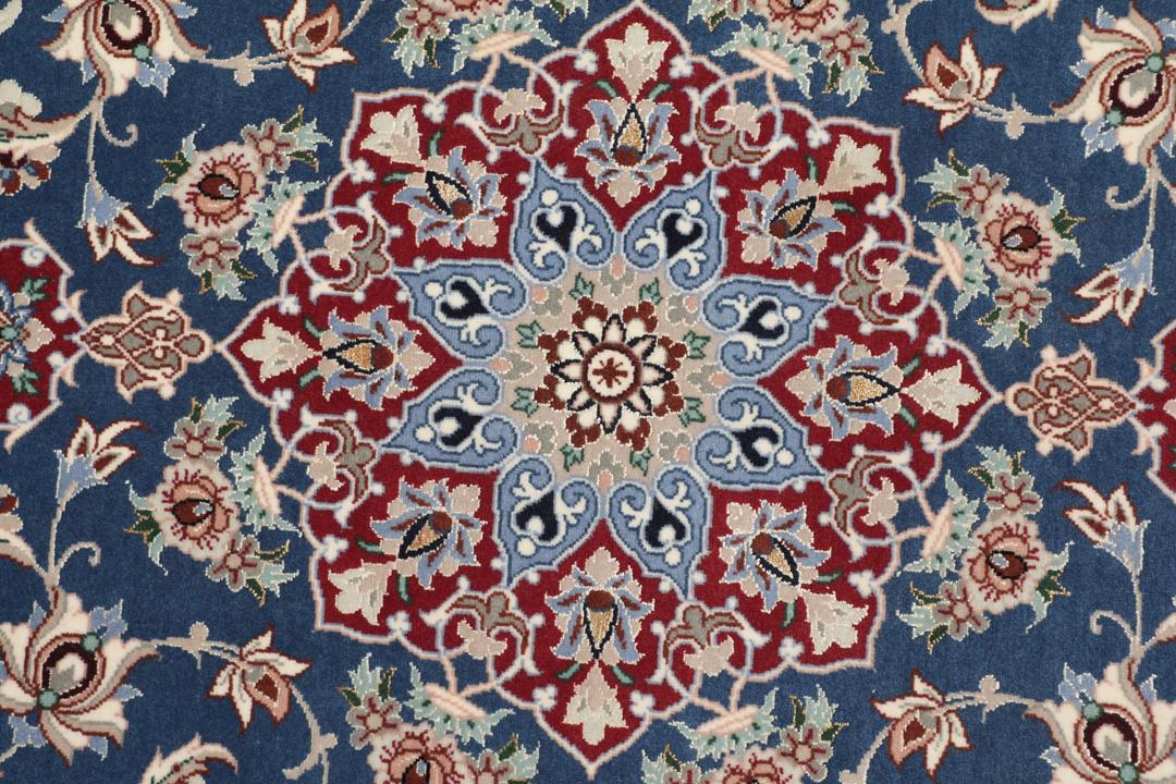 Handgeknoopt Isfahan-tapijt met bloemmotieven in blauw en rood