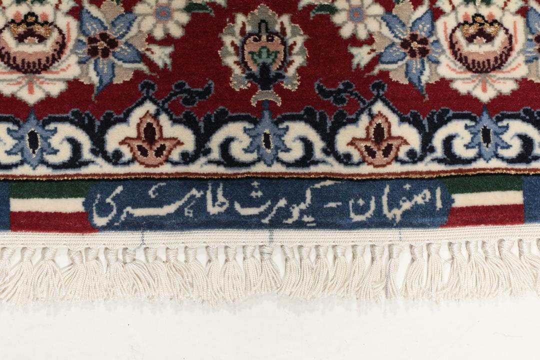 Handgeknoopt Isfahan-tapijt met bloemmotieven in blauw en rood