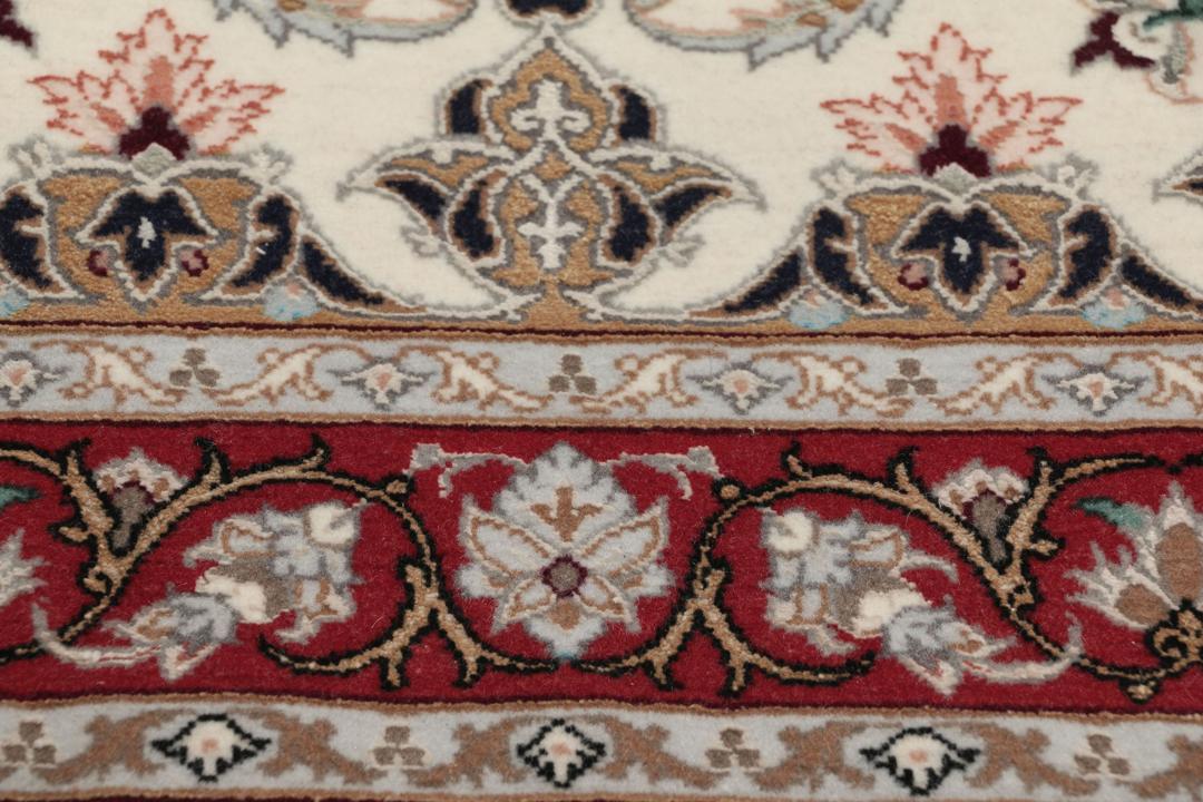 Håndknyttet Isfahan-tæppe fra Mellemøsten med beige bund og rød kant