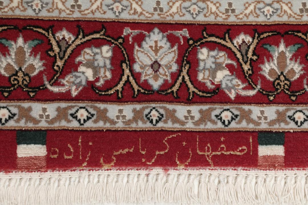 Håndknyttet Isfahan-tæppe fra Mellemøsten med beige bund og rød kant