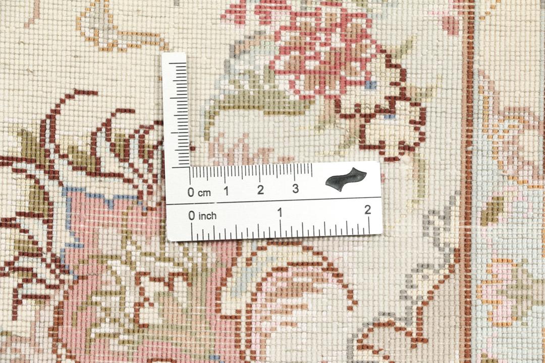 Håndknyttet Tabriz-tæppe med en blomstermedallion i beige og rødt fra Mellemøsten
