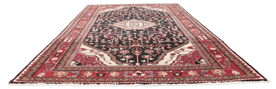 A one-of-a-kind Hamadan rug from the Middle East with a dark-red and black palette.