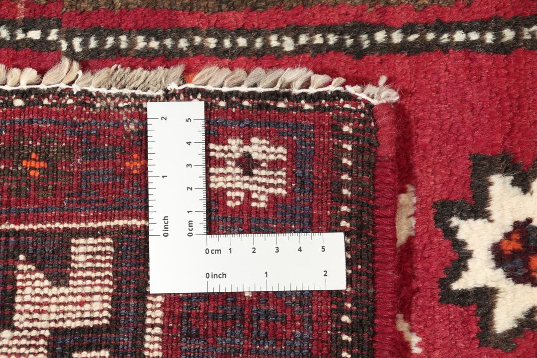 Et unikt håndknyttet Lori-tæppe fra Mellemøsten i mørkerøde og beige nuancer