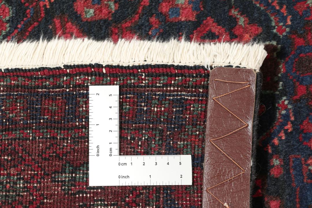 Handgeknoopte Koliai loper uit het Midden-Oosten in donkerrode en zwarte tinten