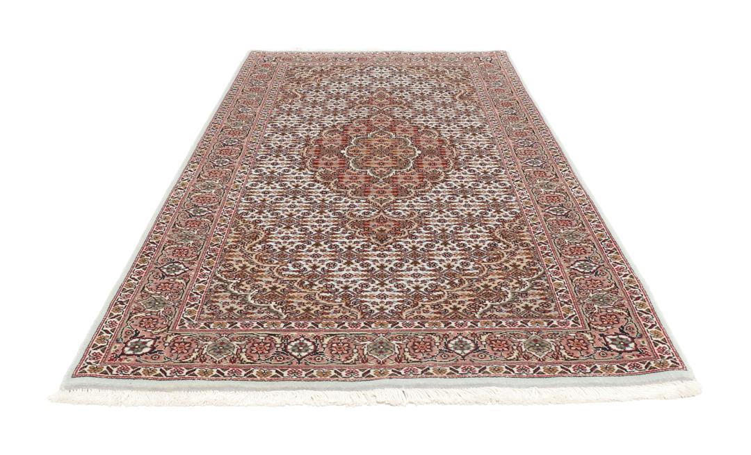 Håndknyttet Tabriz-tæppe fra Mellemøsten i dybe røde og beige nuancer