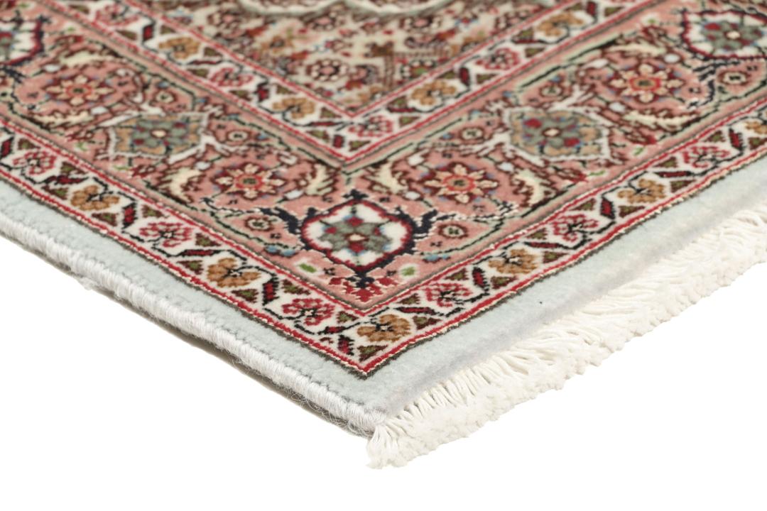 Håndknyttet Tabriz-tæppe fra Mellemøsten i dybe røde og beige nuancer